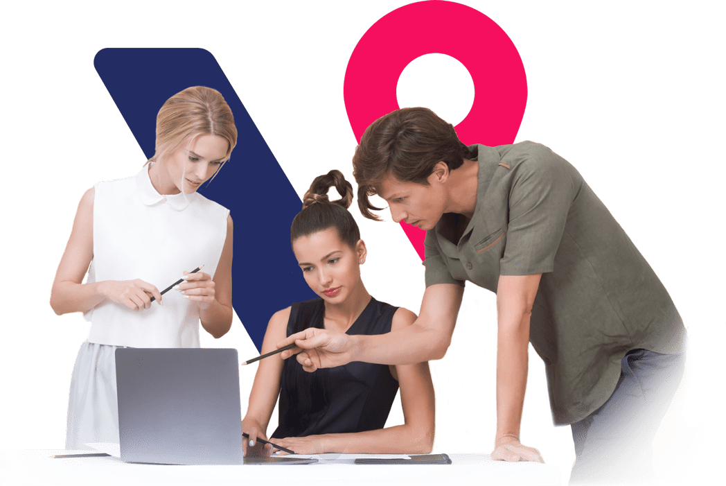 Three office workers gathered around a desk